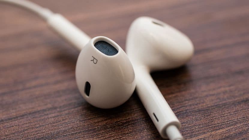 a pair of earphones on a desk